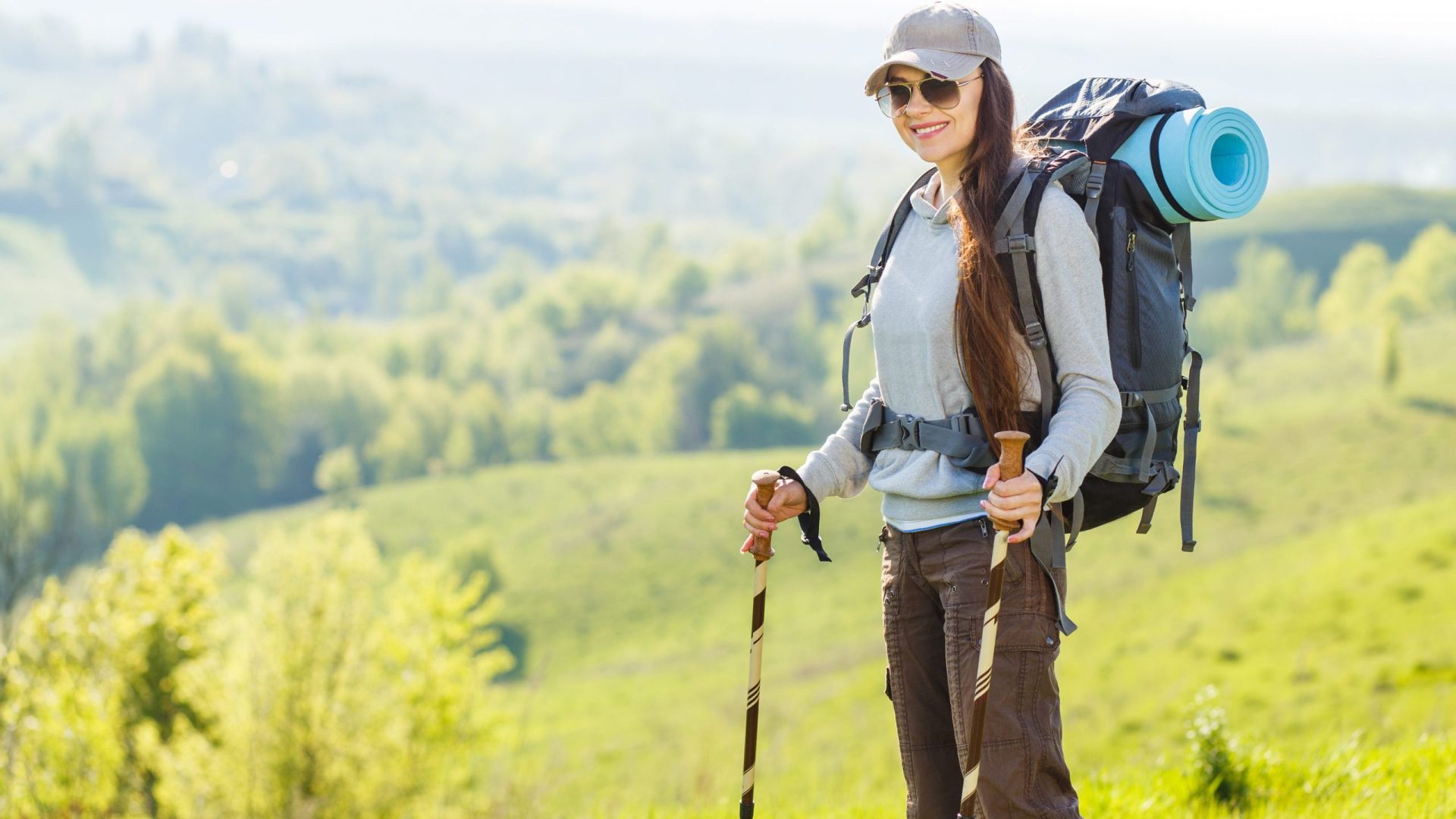 Hiker Backpacker Girl Enjoing Journey In Mountains